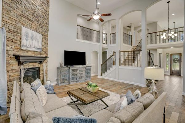 Fireplace, Interior, Living room, Pendant Lights, Recessed Lighting, Stone Walls, Wood Texture Flooring