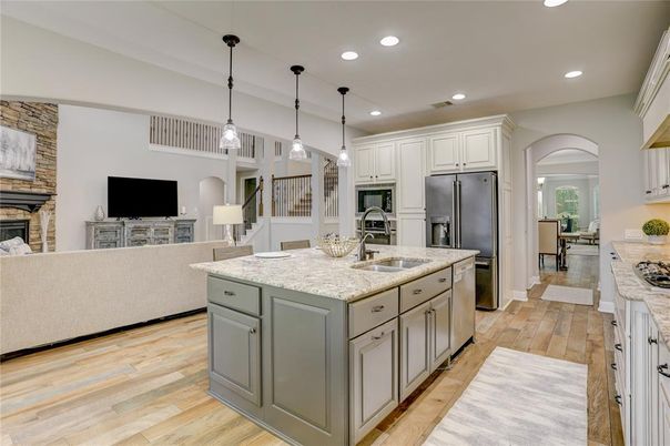 Fireplace, Interior, Kitchen, Pendant Lights, Recessed Lighting, Stainless Steel Appliances, Wood Texture Flooring
