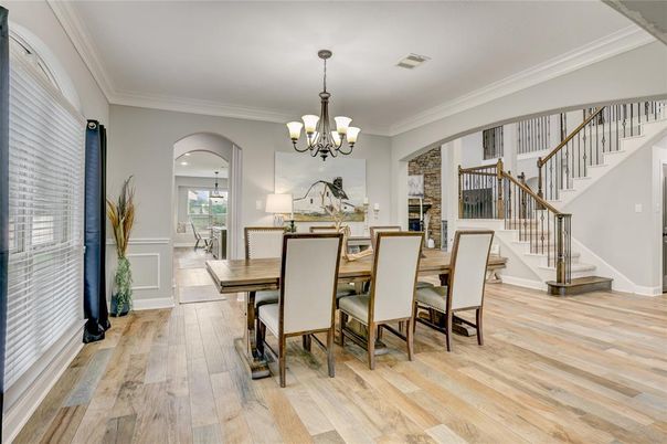 Chandelier, Dining room, Fireplace, Interior, Stone Walls, Wood Texture Flooring