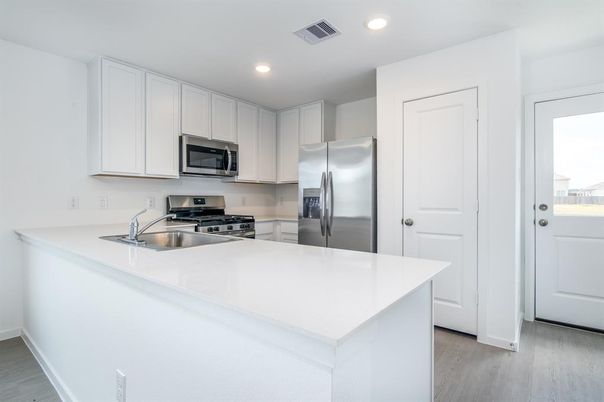 Interior, Kitchen, Recessed Lighting, Stainless Steel Appliances, Wood Texture Flooring