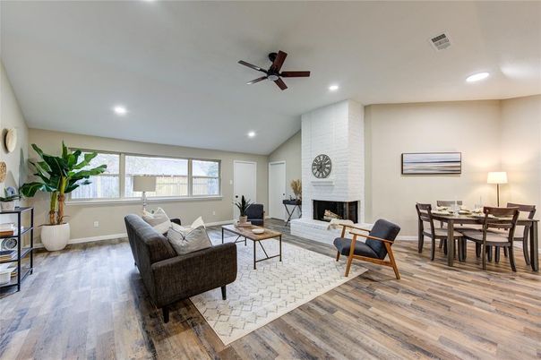 Dining room, Fireplace, Interior, Living room, Recessed Lighting, Wood Texture Flooring