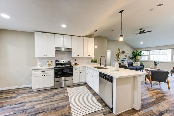 Dining room, Interior, Kitchen, Pendant Lights, Recessed Lighting, Stainless Steel Appliances, Wood Texture Flooring