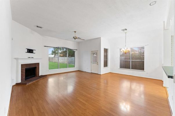 Empty room, Fireplace, Interior, Pendant Lights, Wood Texture Flooring