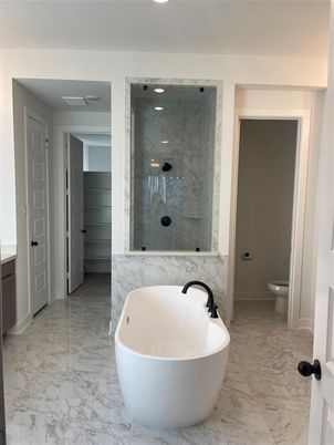 Bathroom, Free Standing Baths, Glass Shower, Interior, Marble, Marble Walls, Recessed Lighting