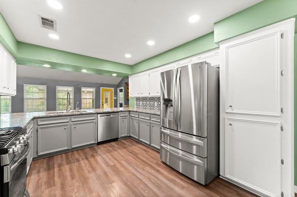 Interior, Kitchen, Recessed Lighting, Stainless Steel Appliances, Wood Texture Flooring