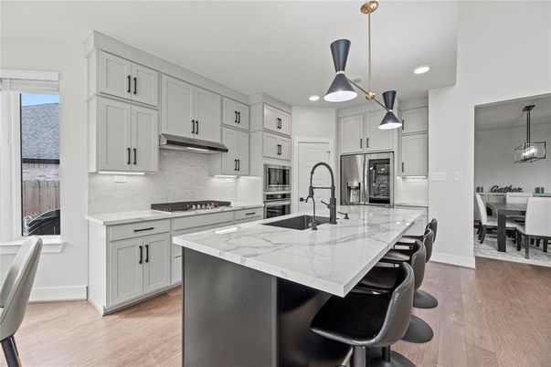 Dining room, Interior, Kitchen, Pendant Lights, Recessed Lighting, Stainless Steel Appliances, Wood Texture Flooring