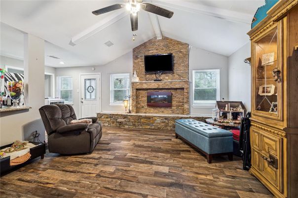 Fireplace, Interior, Recessed Lighting, Stone Walls, Wood Texture Flooring