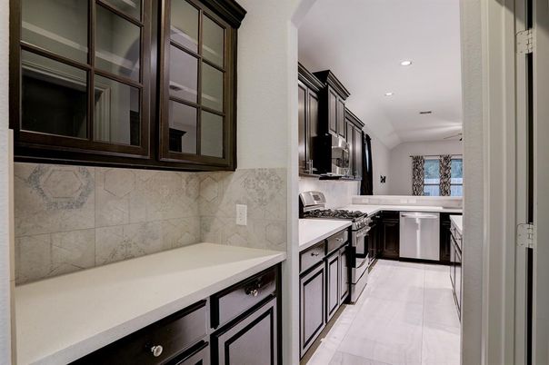 Interior, Kitchen, Marble Walls, Recessed Lighting, Stainless Steel Appliances
