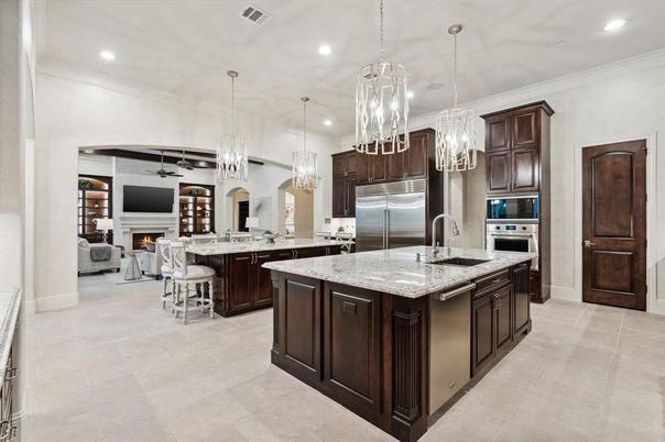 Fireplace, Interior, Kitchen, Living room, Pendant Lights, Recessed Lighting, Stainless Steel Appliances