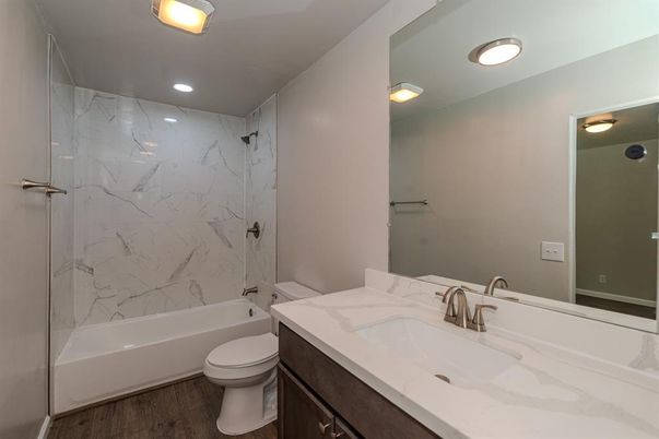 Bathroom, Interior, Marble Walls, Recessed Lighting, Wood Texture Flooring