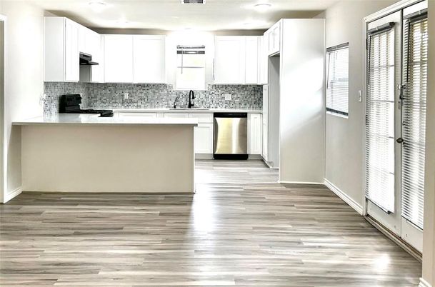 Interior, Kitchen, Recessed Lighting, Stainless Steel Appliances, Wood Texture Flooring