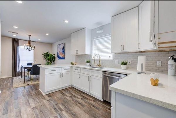 Chandelier, Dining room, Interior, Kitchen, Recessed Lighting, Stainless Steel Appliances, Wood Texture Flooring