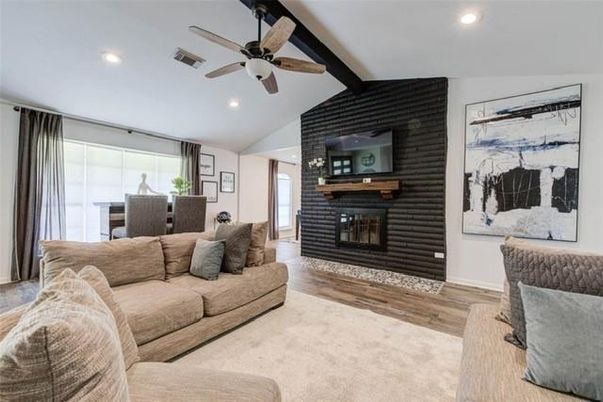 Fireplace, Interior, Living room, Recessed Lighting, Stone Walls, Wood Texture Flooring