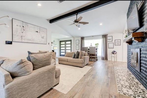 Fireplace, Interior, Living room, Recessed Lighting, Stone Walls, Wooden Beams, Wood Texture Flooring