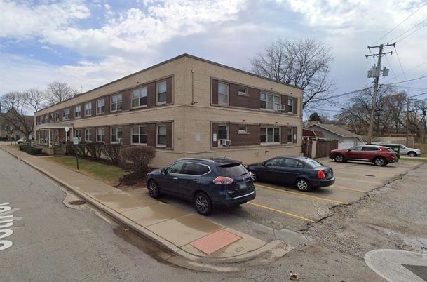 Exterior, Facade, Brick Facade, Condo Building