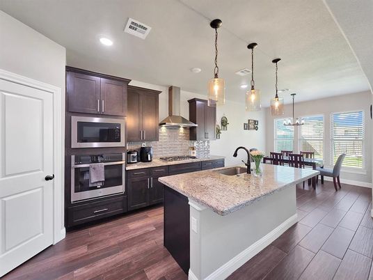 Dining room, Interior, Kitchen, Pendant Lights, Recessed Lighting, Stainless Steel Appliances, Wood Texture Flooring