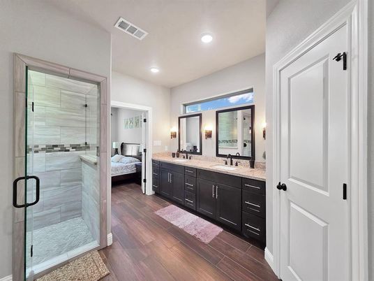 Bathroom, Bedroom, Dual Sink Vanities, Glass Shower, Interior, Recessed Lighting, Wood Texture Flooring