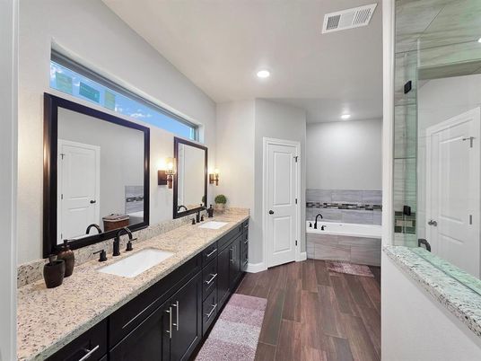 Bathroom, Dual Sink Vanities, Glass Shower, Interior, Recessed Lighting, Wood Texture Flooring