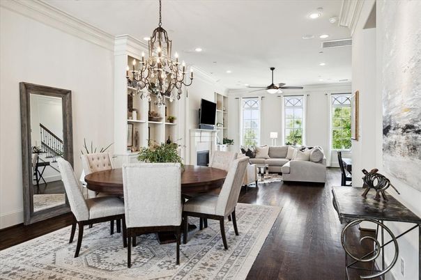 Chandelier, Dining room, Fireplace, Interior, Living room, Recessed Lighting, Wood Texture Flooring
