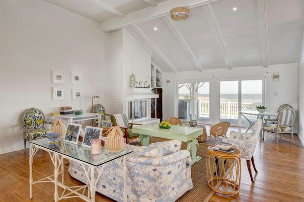 Dining room, Fireplace, Interior, Living room, Recessed Lighting, Water, Wood Texture Flooring
