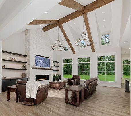 Chandelier, Fireplace, Interior, Living room, Recessed Lighting, Stone Walls, Wooden Beams, Wood Texture Flooring