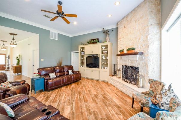 Fireplace, Interior, Living room, Pendant Lights, Recessed Lighting, Stone Walls, Wood Texture Flooring