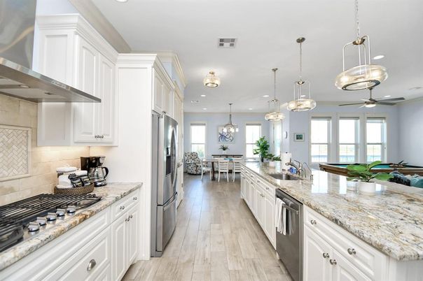 Dining room, Interior, Kitchen, Pendant Lights, Recessed Lighting, Stainless Steel Appliances, Wood Texture Flooring
