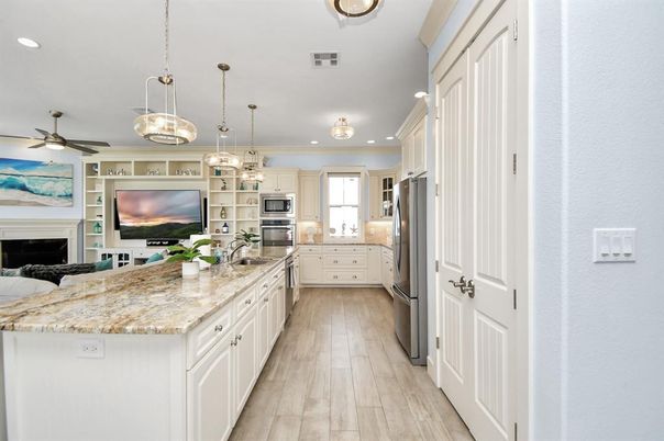 Interior, Kitchen, Pendant Lights, Recessed Lighting, Stainless Steel Appliances, Wood Texture Flooring