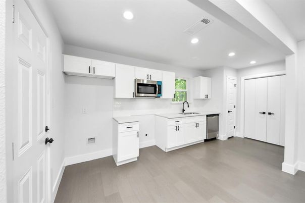 Interior, Kitchen, Recessed Lighting, Stainless Steel Appliances, Wood Texture Flooring
