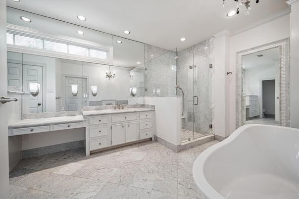 Bathroom, Dual Sink Vanities, Free Standing Baths, Glass Shower, Interior, Marble Walls, Recessed Lighting