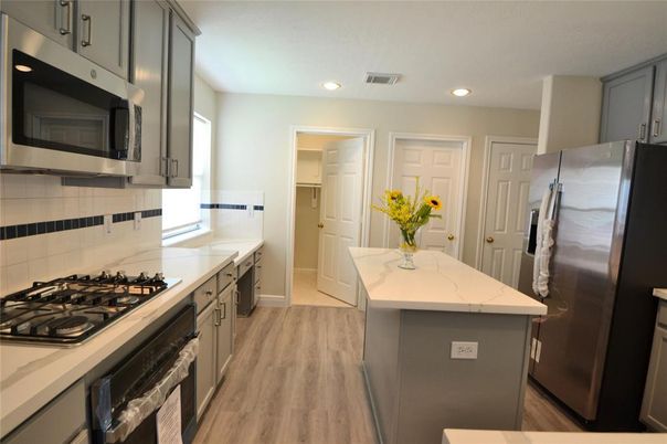 Interior, Kitchen, Recessed Lighting, Stainless Steel Appliances, Wood Texture Flooring