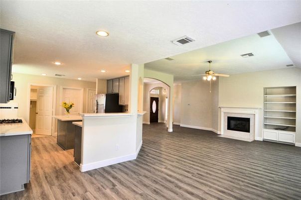 Fireplace, Interior, Kitchen, Recessed Lighting, Wood Texture Flooring