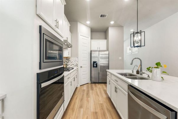 Interior, Kitchen, Pendant Lights, Recessed Lighting, Stainless Steel Appliances, Wood Texture Flooring