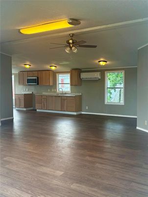 Empty room, Interior, Kitchen, Stainless Steel Appliances, Wood Texture Flooring