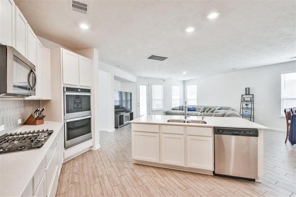 Interior, Kitchen, Recessed Lighting, Stainless Steel Appliances, Wood Texture Flooring