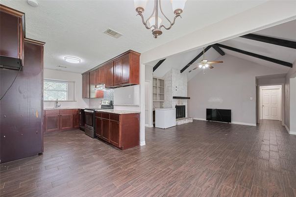 Chandelier, Fireplace, Interior, Kitchen, Stone Walls, Wood Texture Flooring