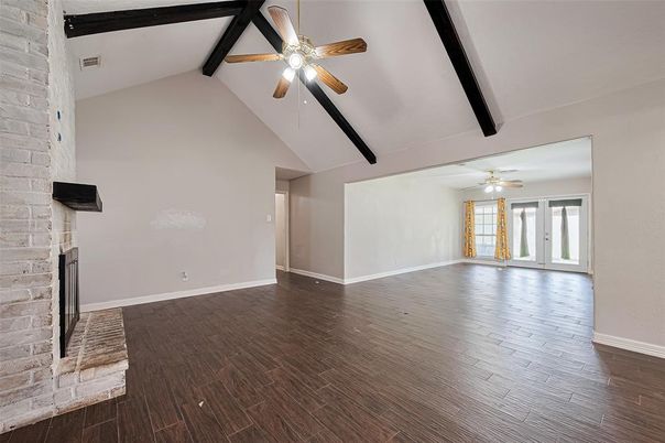 Empty room, Fireplace, Interior, Stone Walls, Wooden Beams, Wood Texture Flooring