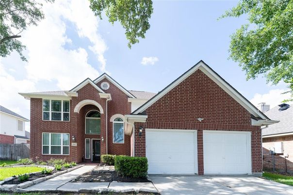 Attached, Exterior, Facade, Brick Facade, Brick Traditional