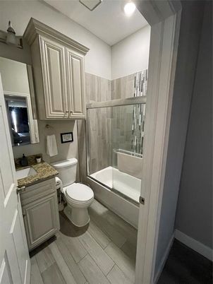 Bathroom, Glass Shower, Interior, Recessed Lighting, Wood Texture Flooring