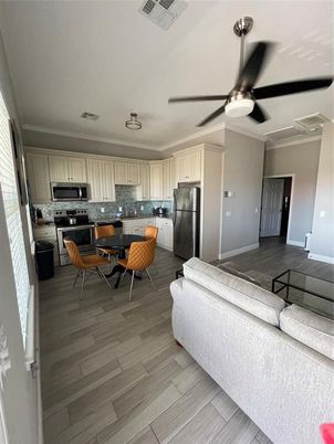 Dining room, Interior, Kitchen, Living room, Stainless Steel Appliances, Wood Texture Flooring