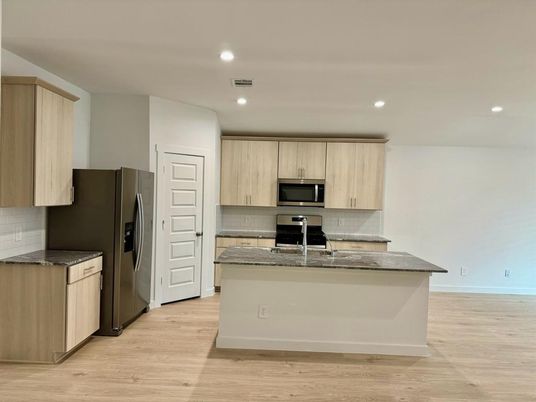 Interior, Kitchen, Recessed Lighting, Stainless Steel Appliances, Wood Texture Flooring