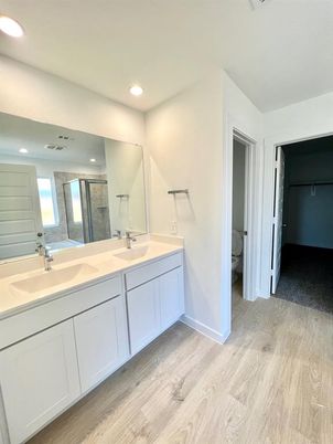 Bathroom, Dual Sink Vanities, Interior, Recessed Lighting, Wood Texture Flooring