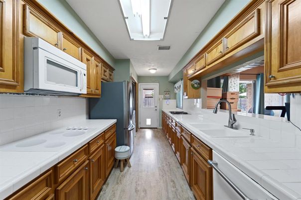 Interior, Kitchen, Tile Countertops, Wood Texture Flooring
