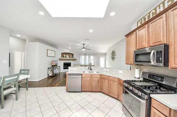 Dining room, Fireplace, Interior, Kitchen, Recessed Lighting, Wood Texture Flooring