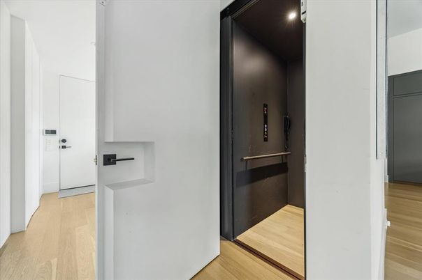Elevator, Interior, Recessed Lighting, Wood Texture Flooring
