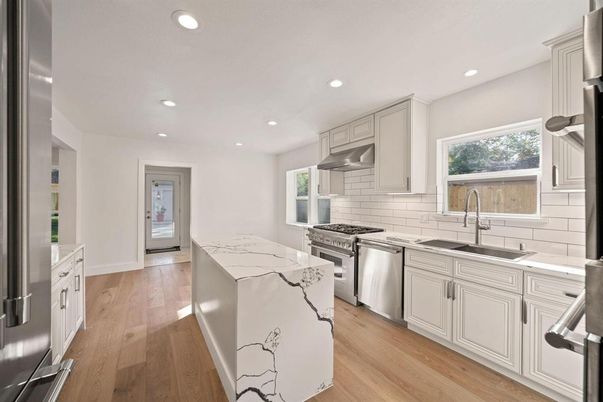 Interior, Kitchen, Recessed Lighting, Stainless Steel Appliances, Wood Texture Flooring