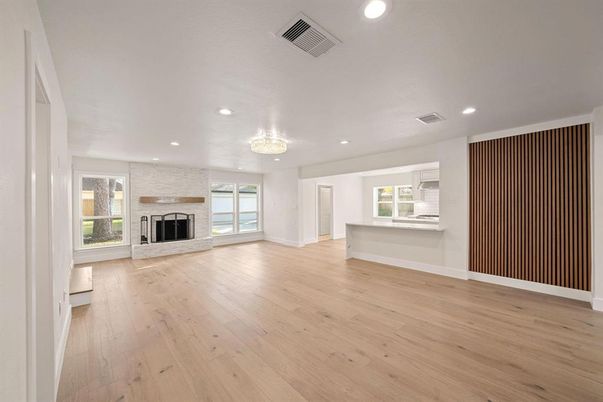Chandelier, Empty room, Fireplace, Interior, Recessed Lighting, Wood Texture Flooring