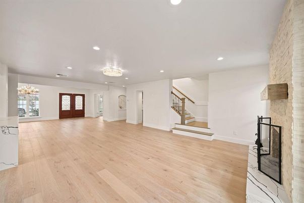 Chandelier, Empty room, Fireplace, Interior, Recessed Lighting, Wood Texture Flooring