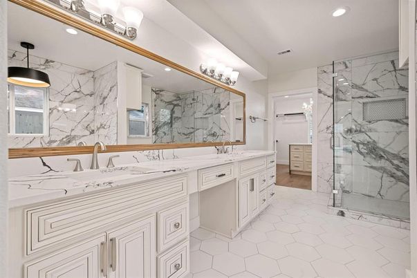 Bathroom, Dual Sink Vanities, Glass Shower, Interior, Marble Walls, Recessed Lighting