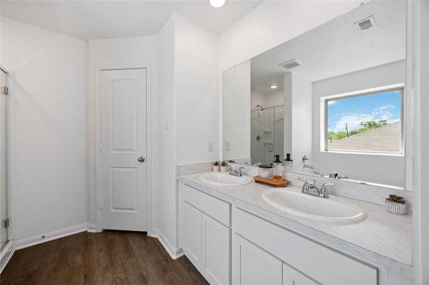 Bathroom, Dual Sink Vanities, Interior, Recessed Lighting, Wood Texture Flooring